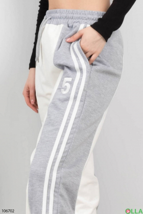 Жіночі сіро-білі спортивні брюки