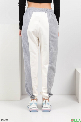 Жіночі сіро-білі спортивні брюки