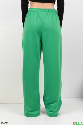 Жіночі зелені спортивні брюки