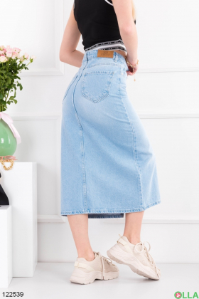 Women's blue denim skirt with a slit