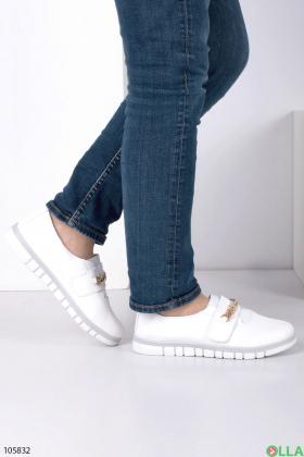 Women's white slip-ons with a chain