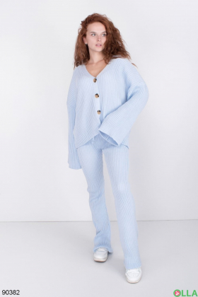 Women's blue knitted suit with a button-down jacket