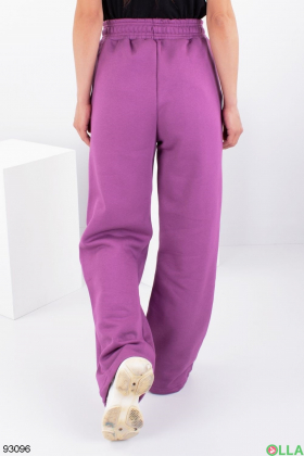 Жіночі фіолетові спортивні брюки на флісі