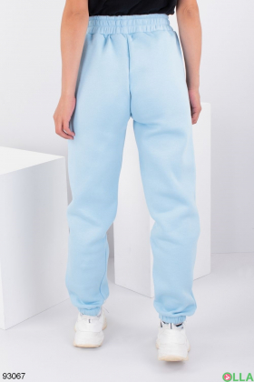 Жіночі блакитні спортивні брюки на флісі