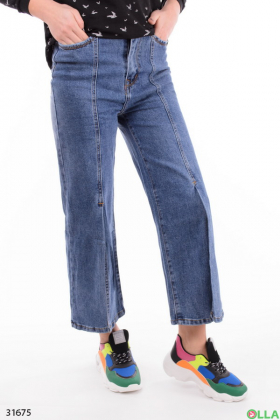 Широкие женские джинсы с разрезами