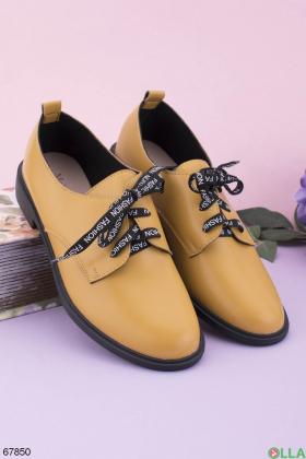 Women's yellow lace-up shoes