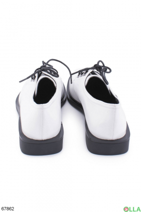Women's white lace-up shoes
