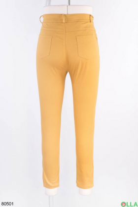 Жіночі темно-жовті джинси