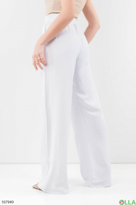 Жіночі білі брюки-палаццо