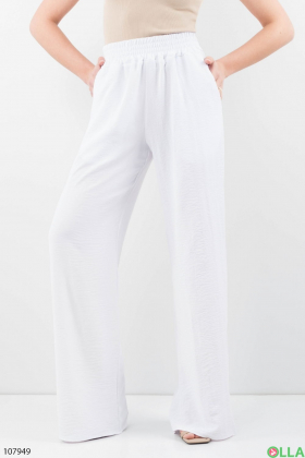 Женские белые брюки-палаццо
