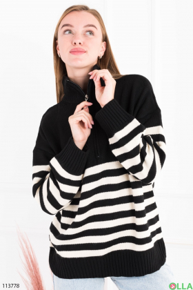 Жіночий чорно-білий светр у смужку