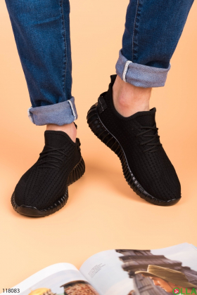 Чоловічі чорні кросівки з текстилю.