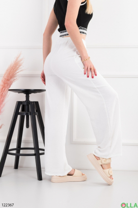Женские белые брюки-палаццо