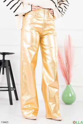 Жіночі золотисті брюки-палаццо з еко-шкіри