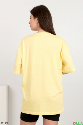 Women's yellow T-shirt with an inscription