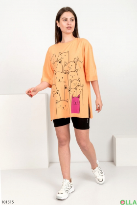 Жіноча помаранчева футболка з принтом