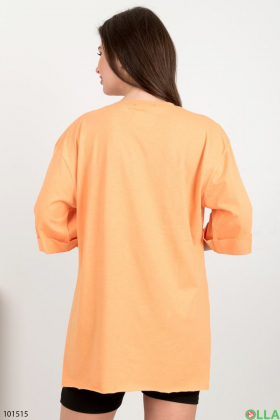 Жіноча помаранчева футболка з принтом