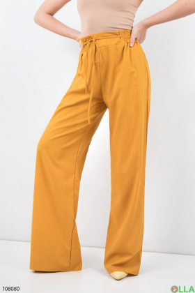 Жіночі помаранчеві брюки-палаццо