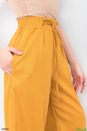Женские оранжевые брюки-палаццо