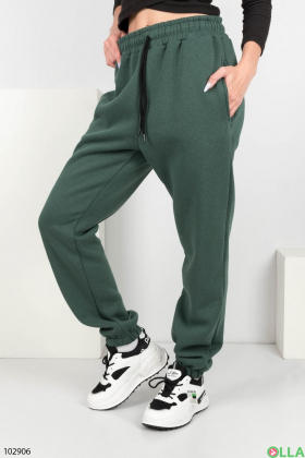 Жіночі зелені спортивні брюки на флісі