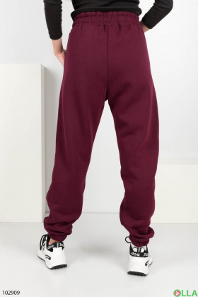 Жіночі бордові спортивні брюки на флісі
