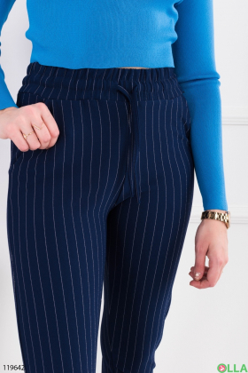 Женские темно-синие брюки-скинни в полоску