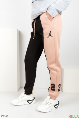 Жіночі зимові чорно-бежеві спортивні брюки