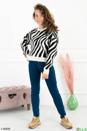 Women's black and white sweater with patterns