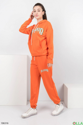 Жіночий помаранчевий спортивний костюм
