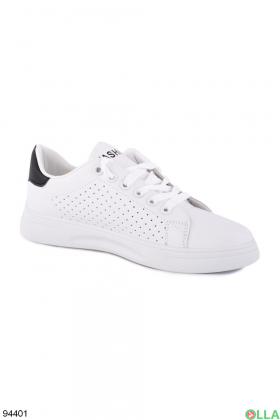 Women's white sneakers with black back