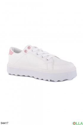 Women's white sneakers with a pink heel