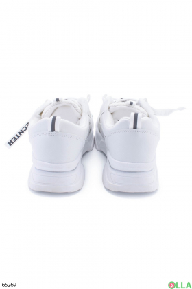 Women's white sneakers with inscriptions