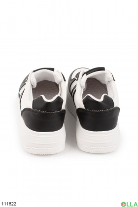 Жіночі чорно-білі кросівки на шнурівці