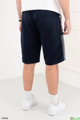 Men's dark blue sports shorts with lettering