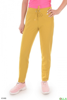 Жіночі брюки жовтого кольору