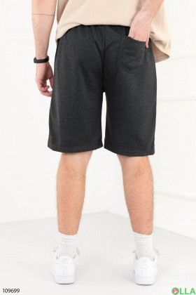 Men's dark gray sports shorts with lettering