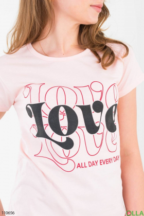 Women's light pink t-shirt with slogan