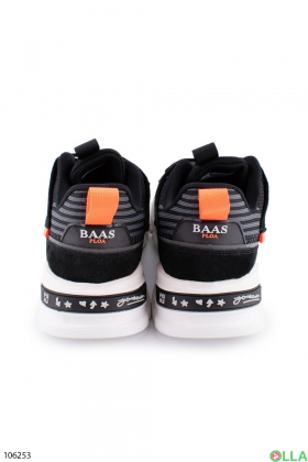 Men's black and gray sneakers with orange inserts