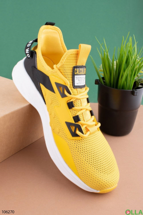 Men's yellow lace-up sneakers