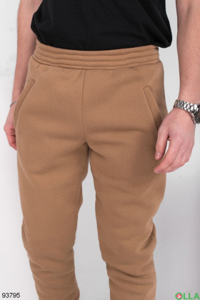 Чоловічі коричневі спортивні брюки на флісі