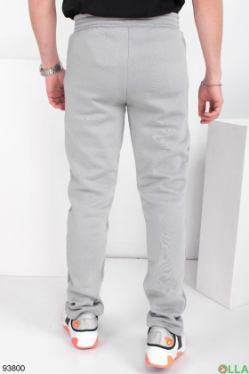Чоловічі світло-бірюзові спортивні брюки на флісі