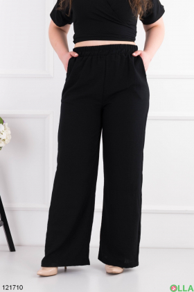 Жіночий чорний комплект з топу та брюк
