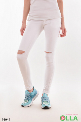 Жіночі білі джинси з прорізами
