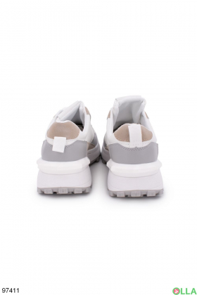 Жіночі сіро-білі кросівки з еко-шкіри