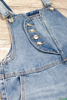 Жіночий синій джинсовий комбінезон