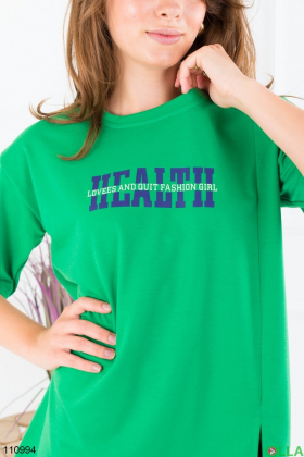 Women's green oversized t-shirt with slogan