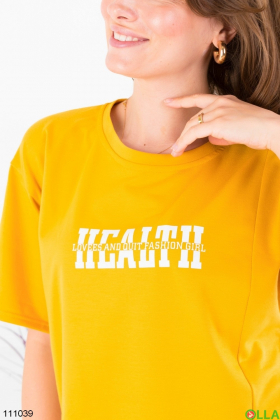 Women's dark yellow oversized t-shirt with slogan