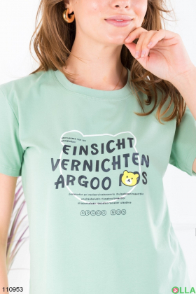 Women's green t-shirt with slogan