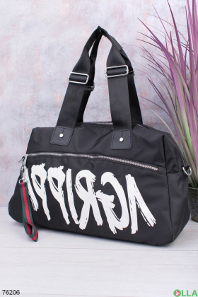Black print duffel bag