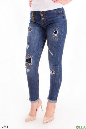 Жіночі джинси з декоративними дірками